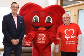 L-R Mike Donaldson, Executive Chair of Donaldson Group, BHF mascot Hearty, and Mark Murphy