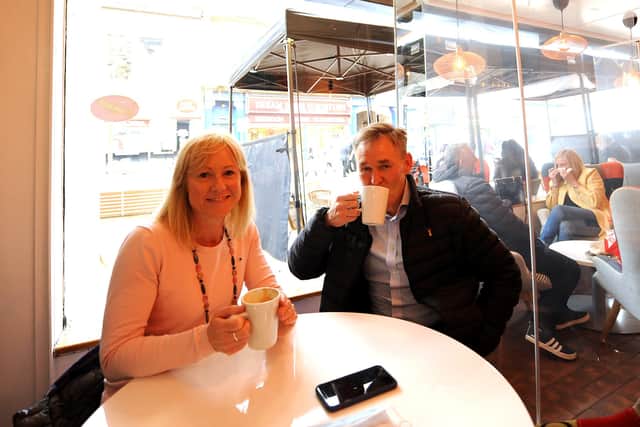 Suzie and John Dempsey enjoy a cuppa indoors at Cupcake Coffee Box which opened on Monday. Pic: Fife Photo Agency