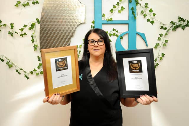 Heavenly Sensations owner Amanda Allan with the awards for best beauty salon and Fife and best beauty salon in Scotland. Pic:  Fife Photo Agency
