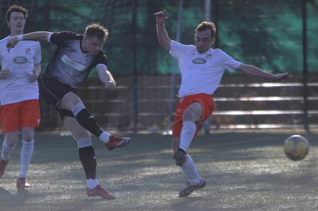 Tayport (in black) in action against Letham (picture by Ryan Masheder