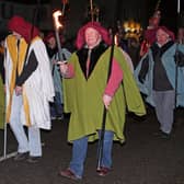 Newburgh High Street is lined with locals and visitors on Hogmanay for the popular Newburgh Caledonian Lodge of Oddfellows annual torchlight procession. (Pic: David Scott)