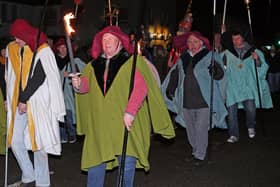 Newburgh High Street is lined with locals and visitors on Hogmanay for the popular Newburgh Caledonian Lodge of Oddfellows annual torchlight procession. (Pic: David Scott)