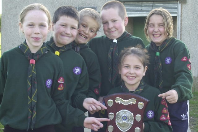 The 24th Fife Cub Group, based in Kirkcaldy, won the Goodfellow Award for safety for the second year in a row in 2001. Claire Williams holds the shield.