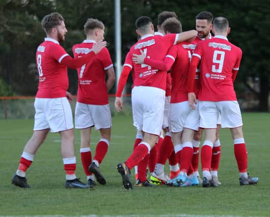 Tayport celebrate after Daniel Dorovic's goal. All pics by Ryan Masheder