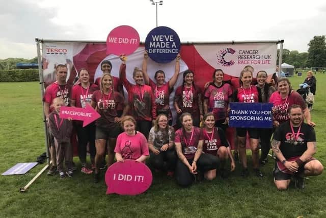 The determined team from St Clair celebrate raising more than £1,300