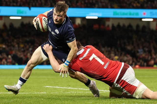 Scotland scrum-half George Horne being tackled by Welsh flanker Tommy Reffell during the visitors' 27-26 Six Nations win at Cardiff's Principality Stadium on Saturday (Photo: Adrian Dennis/AFP via Getty Images)