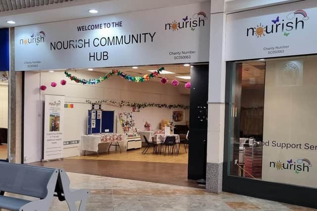The Nourish charity shop and community hub in the Mercat Shopping Centre is marking its first birthday.