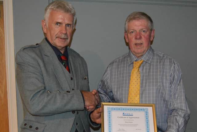 Shane Fenton (right) receives the Lifetime Achievement Award from RSHGA president Charlie Murray.  (pic: submitted)