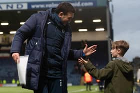Raith boss Ian Murray celebrates with young fan after Saturday's victory over Motherwell (Pic Craig Foy/SNS Group)