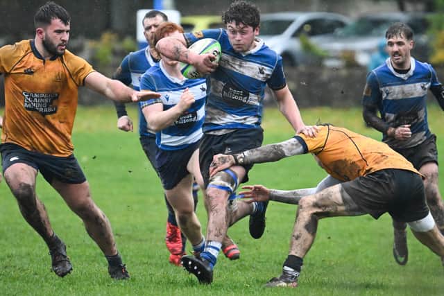 Kieran Todd finding a way through the visitors’ defence as Howe of Fife beat Gordonians 26-19 at home at Cupar’s Duffus Park on Saturday (Photo: Chris Reekie)