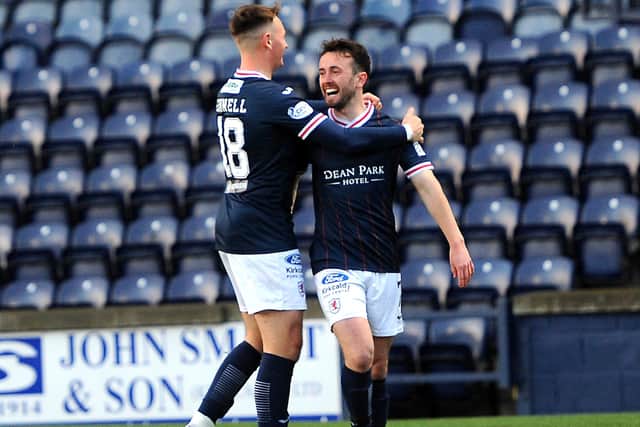 Kyle Connell congratulating Aidan Connolly on scoring a penalty to put Raith Rovers 2-1 up against Hamilton Academical on Saturday (Pic: Fife Photo Agency)