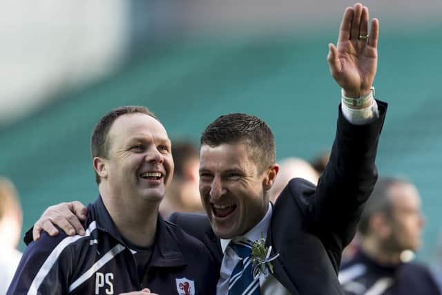 Grant Murray (right) and assistant boss Paul Smith celebrate after beating Ally McCoist's side
