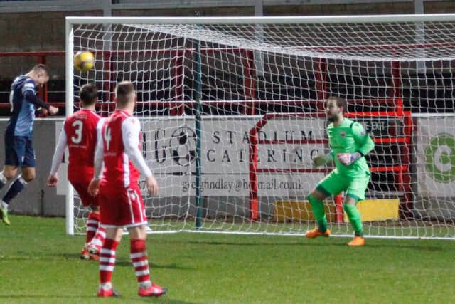 Dylan Tait heads in Rovers' second goal