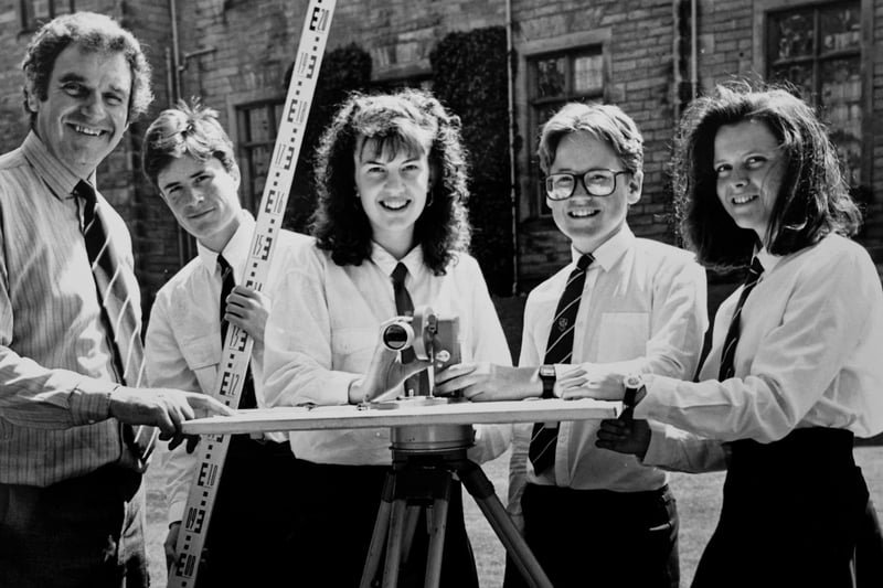 Fife school pupils learn more about the world of surveying in 1989. Pictured with a microptic alidade are (from left) Dr John Soulsby, lecturer in geography at the University of St Andrews; Mark Steward (Kirkcaldy High School); Angela Mitchell (Glenwood High School); Andrew Simpson (Woodmill High School) and Katie Young (Woodmill High School).