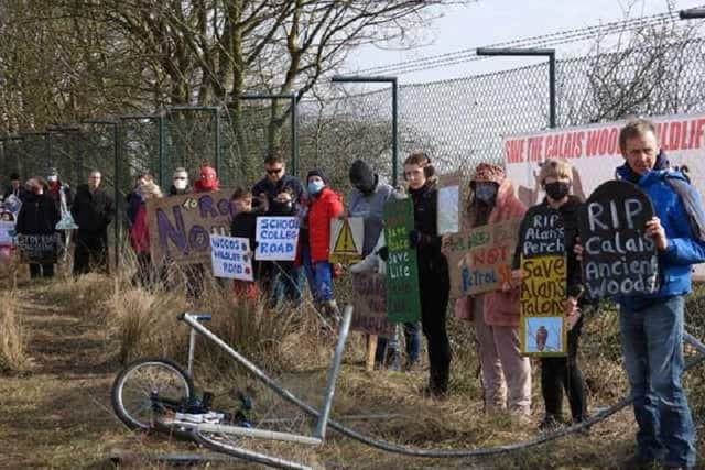 Campaigners protesting to save the woods at the site of the proposed new learning campus