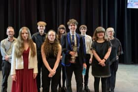 The competitors in the final of the Young Musician class along with the Adjudicators.  Back row, from left: Steven Cowling, Adjudicator; Jack Kitchen – vocal, Kirkcaldy; Tara McGhie – saxophone, Wormit; Daniel Armstrong – cello, Blebo Craigs; Karol Fitzpatrick, Adjudicator.  Front row, from left: Bethany Anna Woodburn – piano, Dunfermline; Libby Hamilton – tuba, Kirkcaldy; Alex Harrower – electric guitar, Kirkcaldy; Emma Roberts – percussion, Kinghorn.