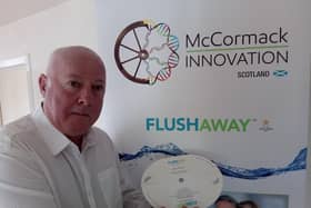 Brian McCormack of McCormack Innovation with the flushaway device
