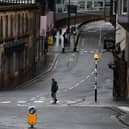 A deserted Edinburgh City Centre in the hours before lockdown began