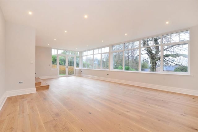 The spectacular large garden/family room overlooks the garden and has French windows opening to the terrace.