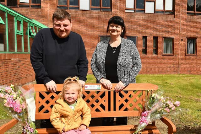 Unveiling memorial bench for Shannon Napier are Jordan Burt with their daughter Abbie, and Shannon's mother Tracy (Pic:  Fife Photo Agency)
