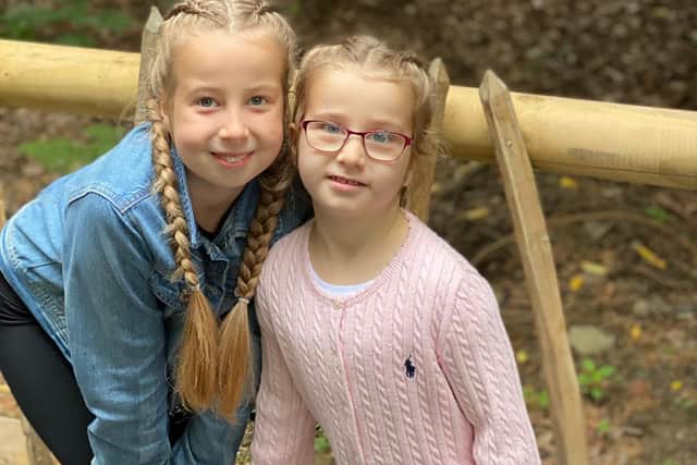 Ruby (left) with her little sister Lacey. Ruby has been doing a walking fundraiser to collect £1640 so far for the children's ward and paediatric epilepsy team at Victoria Hospital, Kirkcaldy.