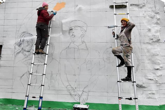 Boudicca Collins and Emma Barney start work on the mural (Pic: Fife Photo Agency)