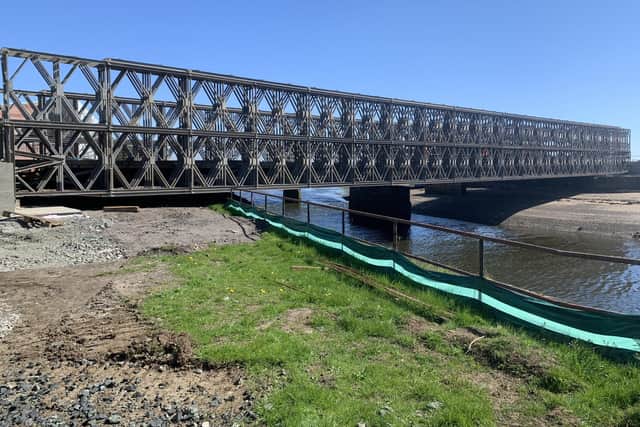 The temporary crossing over the River Leven is set to open enabling demolition to begin on the Bawbee Bridge.