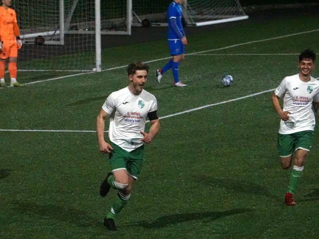 Thornton Hibs' Garry Thomson runs off to celebrate the first of his double in win at Bo'ness Athletic