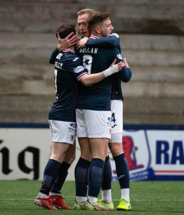Ross Millen (centre) celebrates with Aidan Connolly and Jamie Gullan after opener v Arbroath (Pic Euan Cherry/SNS Group)
