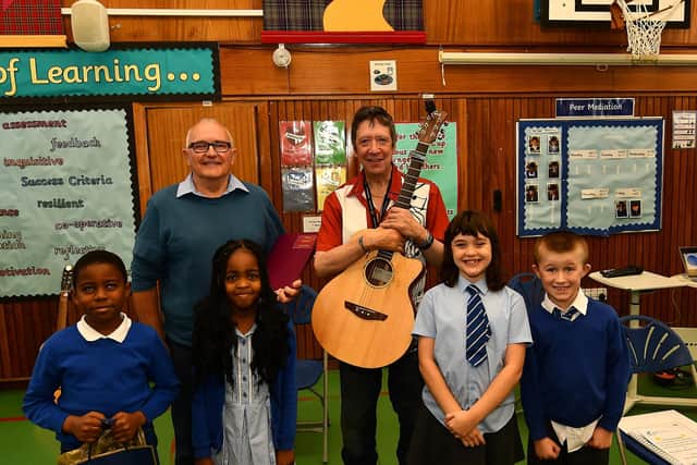 Music teacher Davy Lees has retired after nineteen years of teaching pictured with Bob Brews & pupils Adriel, Warona, Megan and Nathan (Pic: Fife Photo Agency)