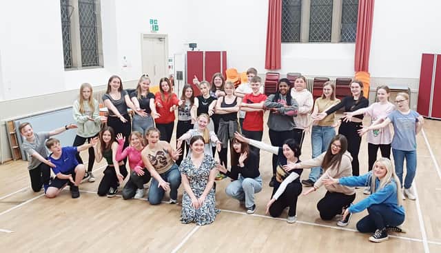 Members of Kirkcaldy Youth Music Theatre at rehearsals with choreographer Sophie Penman ahead of the re-opening gala performance at the Adam Smith Theatre.  (pic: KYMT)