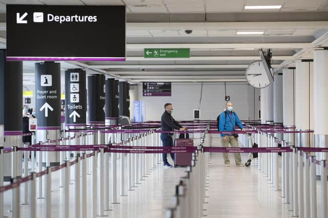 Travellers arriving at Edinburgh Airport. Picture: PA