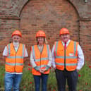 Jenny Gilruth MSP with Duncan Mitchell from FEAT (middle) and representatives from Clark Contractors (far right and far left). The Silverburn Park Flax Mill is scheduled to open in Easter 2026. (Pic: Submitted)