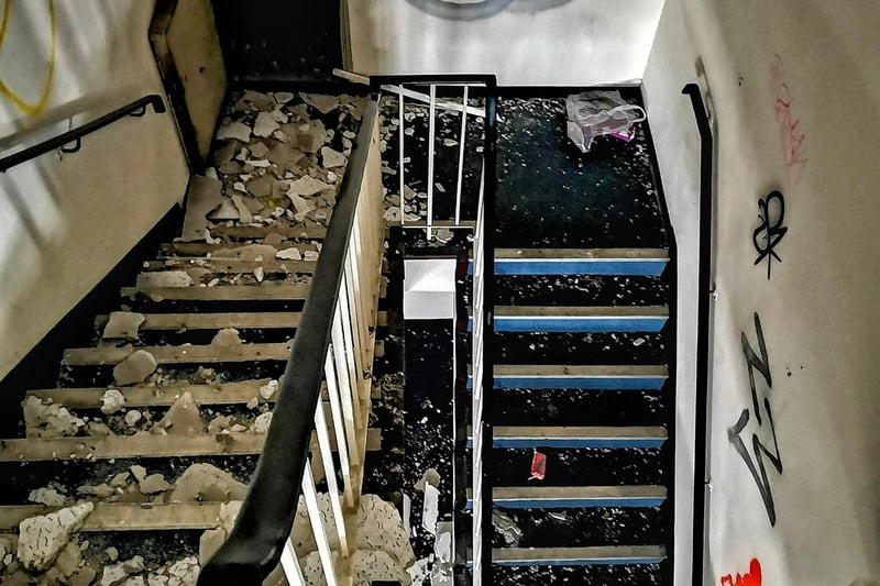 This stairwell at Weston Tower is covered with detritus
