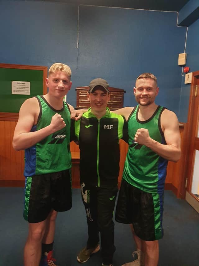Kingdom Boxing's James Fish and Daryl Gray with (centre) coach Mathew Fleming.
