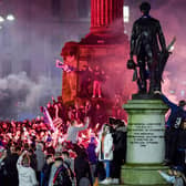Rangers fans gather in George Square to celebrate the club winning the Scottish Premiership for the first time in 10 years, (Photo by Jeff J Mitchell/Getty Images)