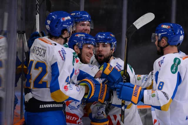 Lucas Sandstrom is mobbed by team-mates after netting a key goal against Sheffield Steelers (Pic: Dean Woolley)