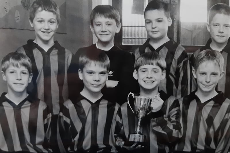 Winners of the 1998 Fife sevens football competition at St Ninian’s proudly show off their trophy. Pictured (back row, from left), Grant McKay, Graham DiFolco, Scott Fleming, and Martin Dickson. Front (from left) Levi Crombie, Graham Meldrum, Ricky Patrick and Steven Campbell.