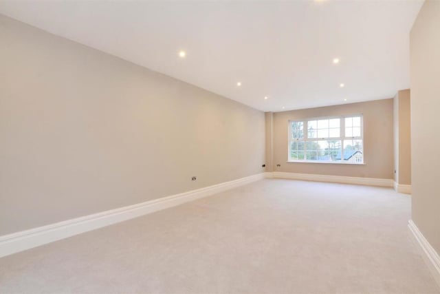 This large double bedroom has front and side windows, offering lots of light.