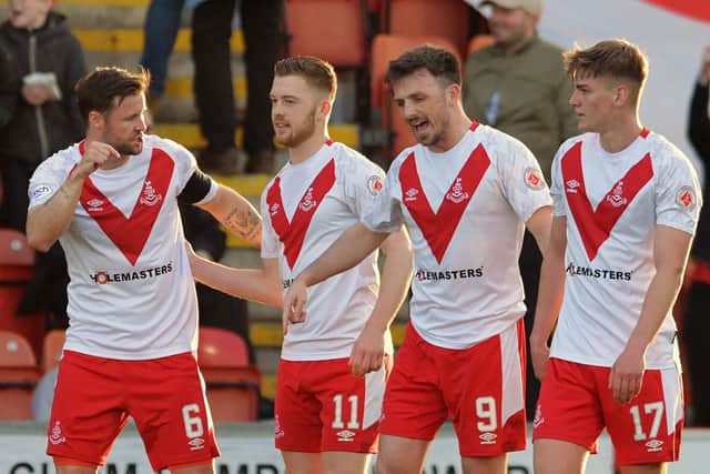 Callum Smith (2nd left) celebrates after netting for Airdrie in Championship play-off win over Falkirk (Pic by Michael Gillen)