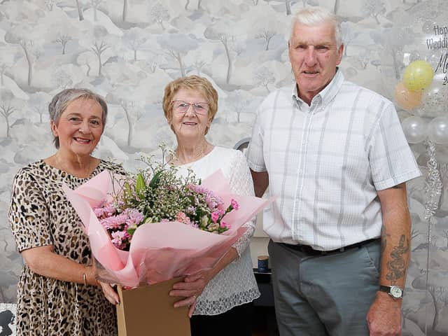 Jock and Margaret Mutch with Councillor Anne Marie Caldwell | Pic Fife Council