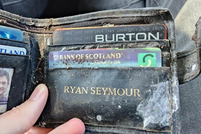 The wallet, which had been a present from Ryan's mum, has been lying in a bush for 17 years.