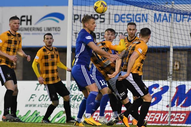 The East Fife defence are back in numbers to bring a halt to a Peterhead attack