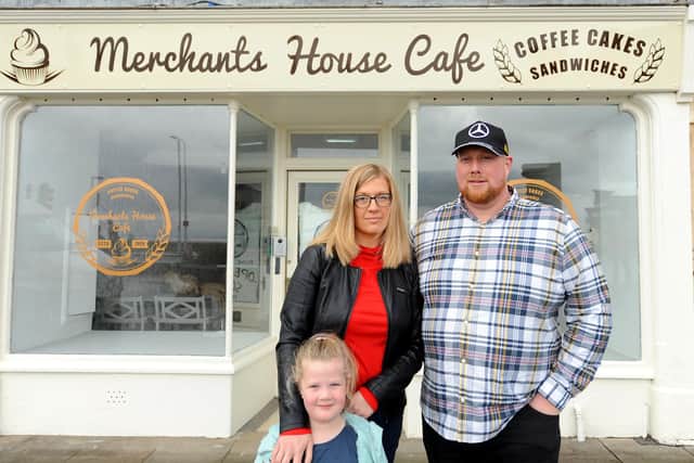 Ricky Barclay - owner of the new Merchants House cafe - with wife Marzena and daughter Hanna. Pic: Fife Photo Agency.