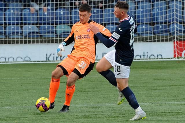 Raith Rovers striker Kyle Connell going one on one with Hamilton goalkeeper Jamie Smith (Pic: Fife Photo Agency)