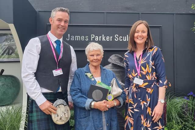 James and Lesley with Dame Judi Dench at their trade stand at Chelsea Flower Show