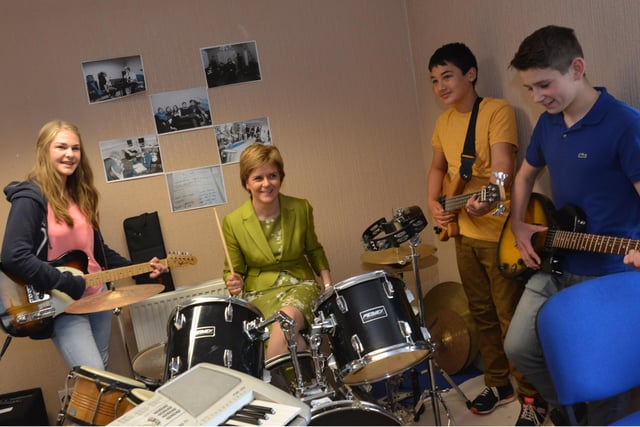 The First Minister picked up a set of drum sticks on a visit to Cupar Youth Cafe in 2015