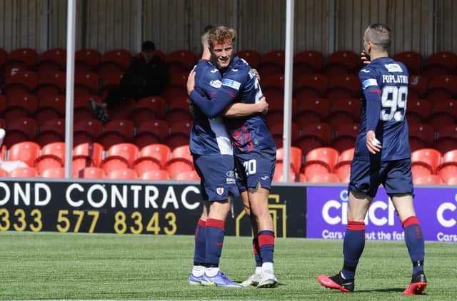Ben Williamson (centre) is congratulated after opening the scoring against Hamilton. (Pic: Alan Murray)