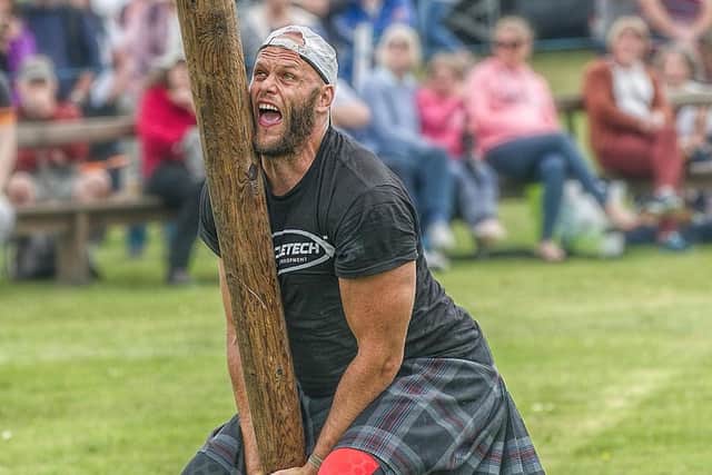 Vlad Tulacek tossing the caber at Markinch Highland Games (picture: Nige Hutchsion) 