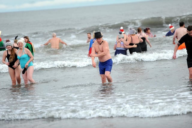 A number of brave souls took the plunge into the chilly River Forth to start the new year.